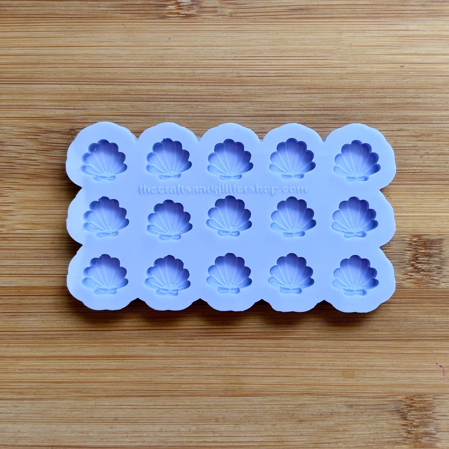 Food safe seashell silicone mold with 15 cavities of 15mm each.