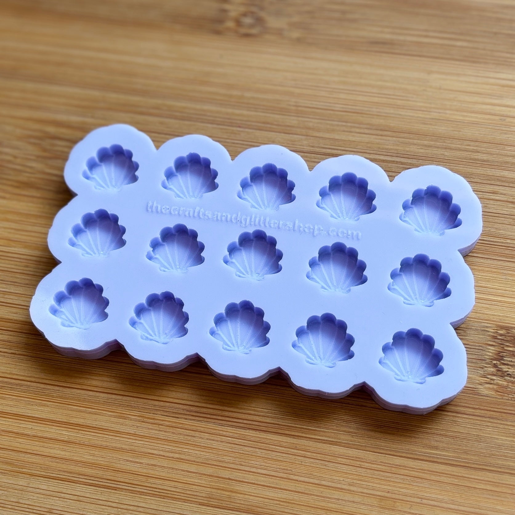 Food safe seashell silicone mold with 15 cavities of 15mm each.