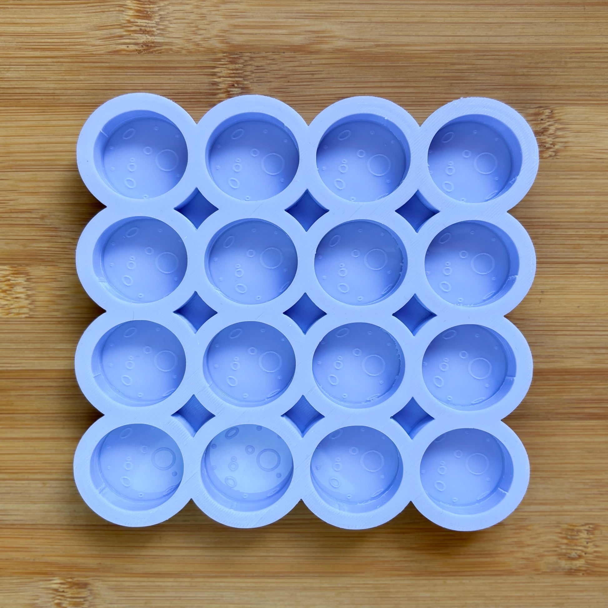 Food Safe Full Moon Silicone Mold with 16 cavities of 3 cm each.