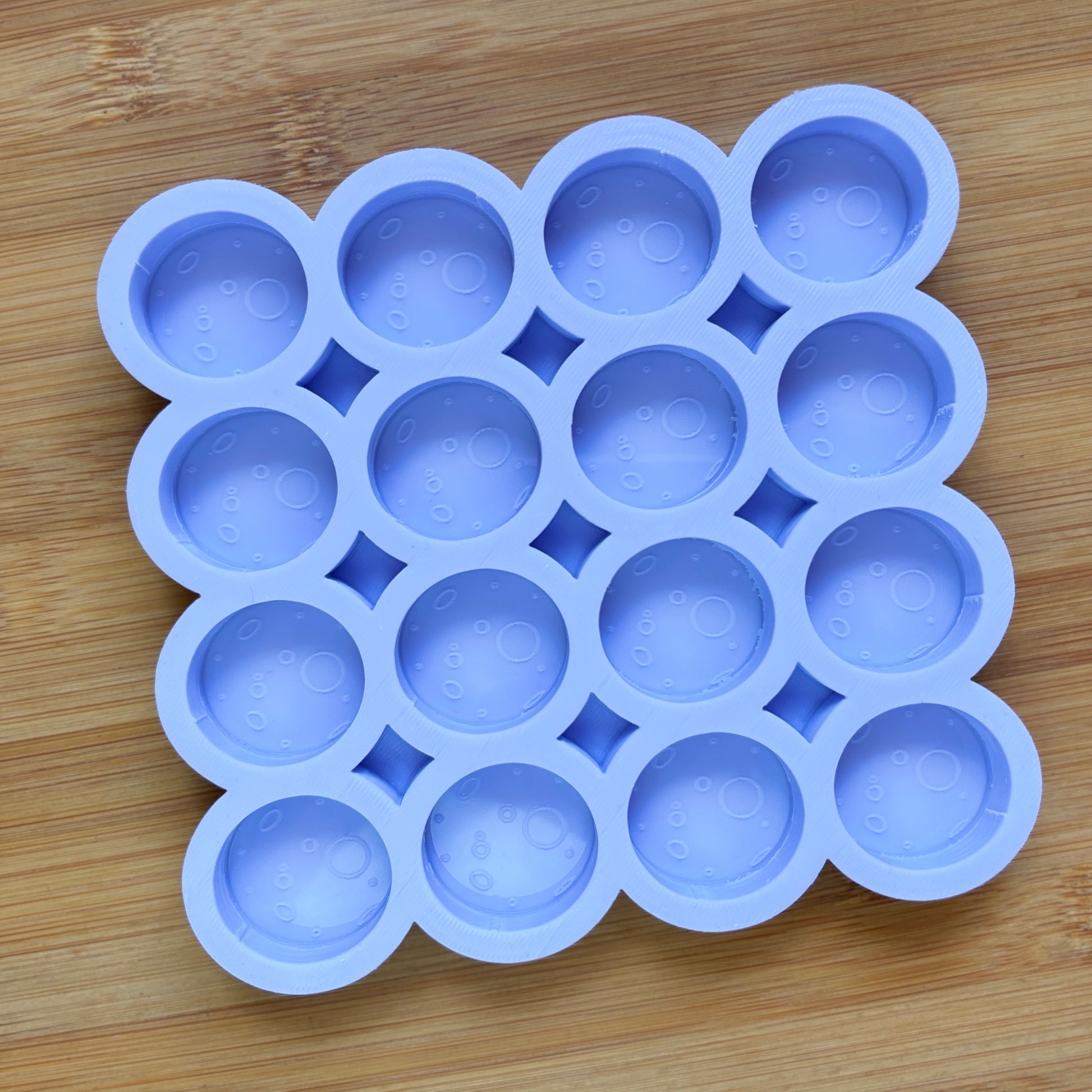Food Safe Full Moon Silicone Mold with 16 cavities of 3 cm each.