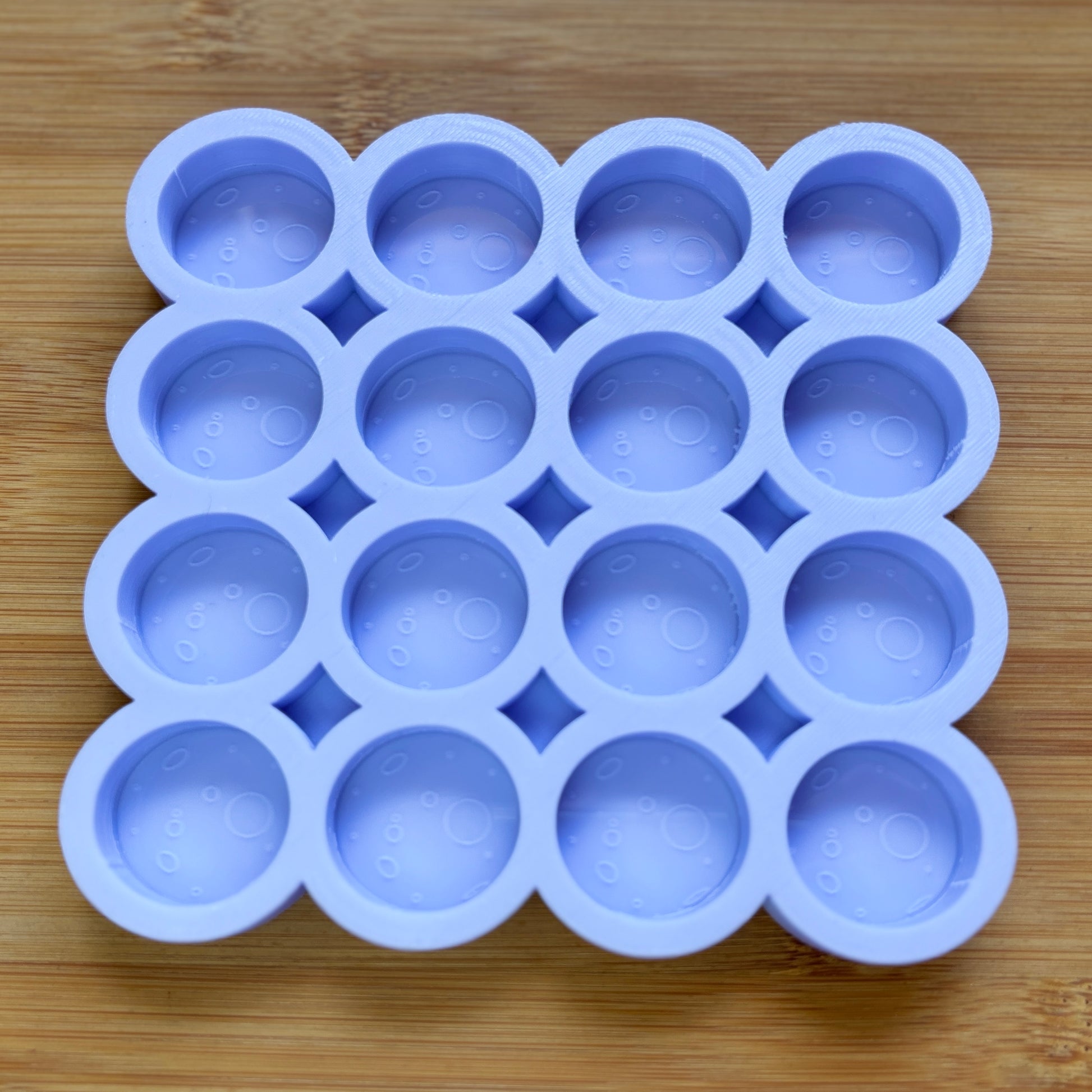 Food Safe Full Moon Silicone Mold with 16 cavities of 3 cm each.