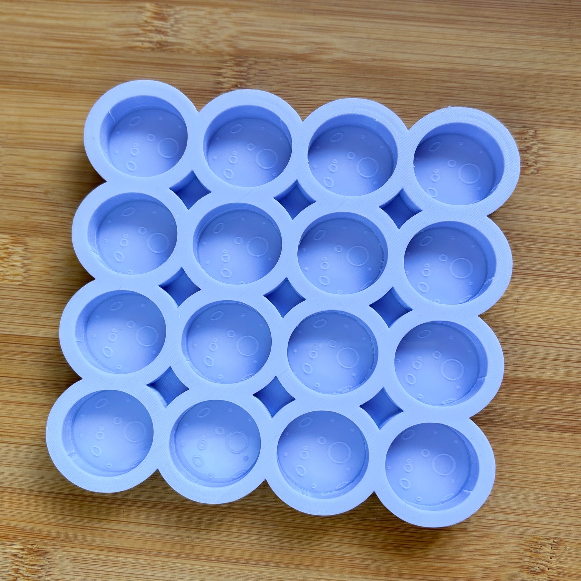 Food Safe Full Moon Silicone Mold with 16 cavities of 3 cm each.