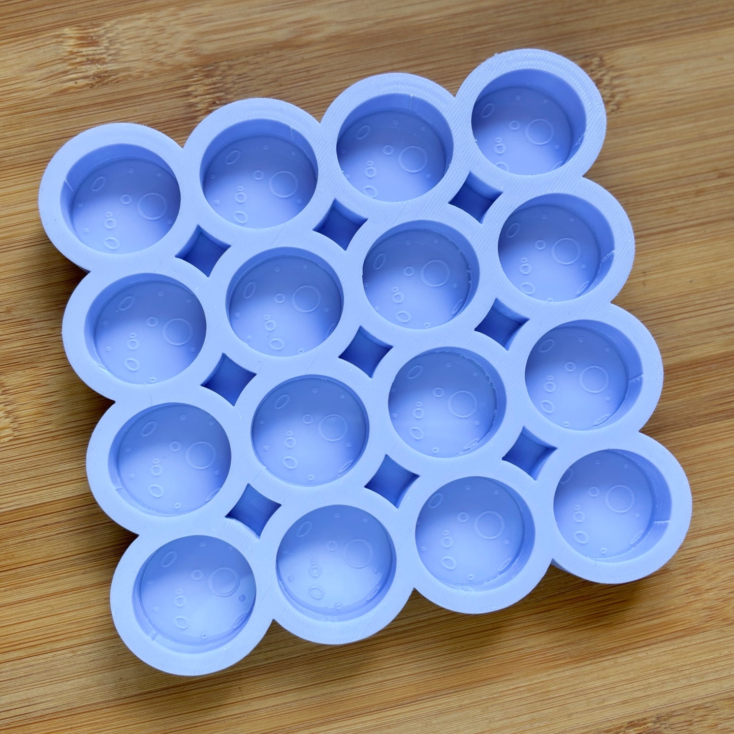 Food Safe Full Moon Silicone Mold with 16 cavities of 3 cm each.