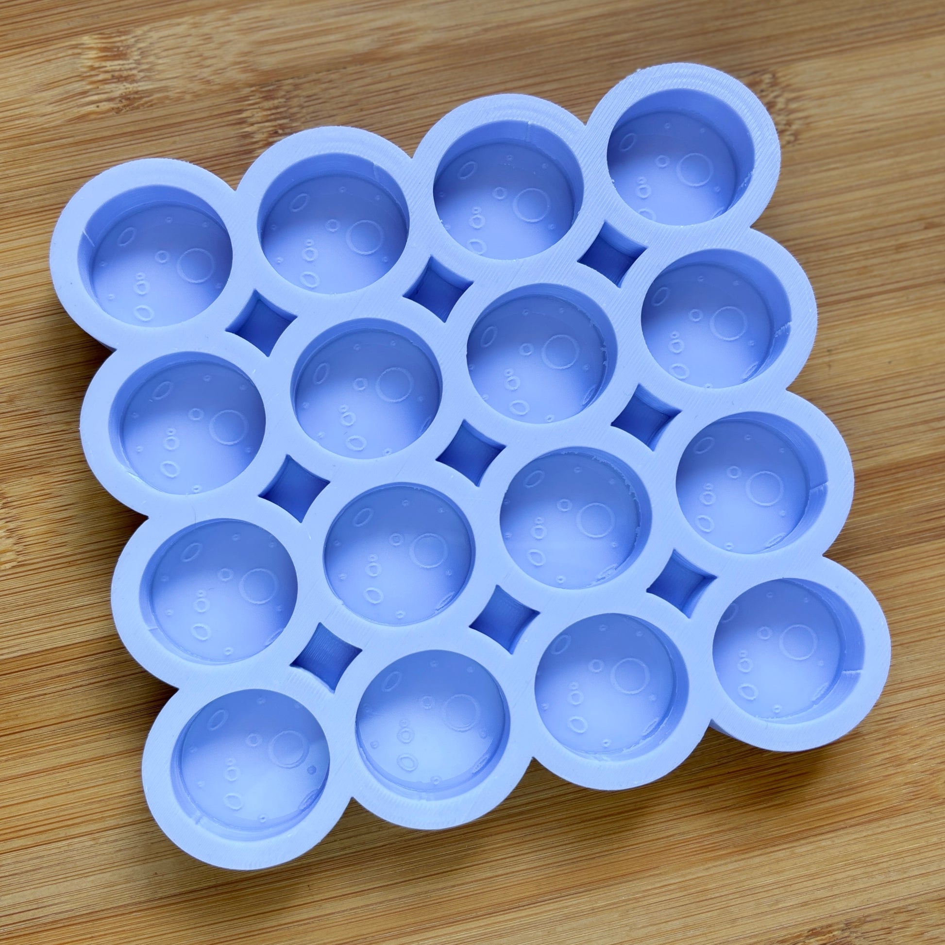 Food Safe Full Moon Silicone Mold with 16 cavities of 3 cm each.