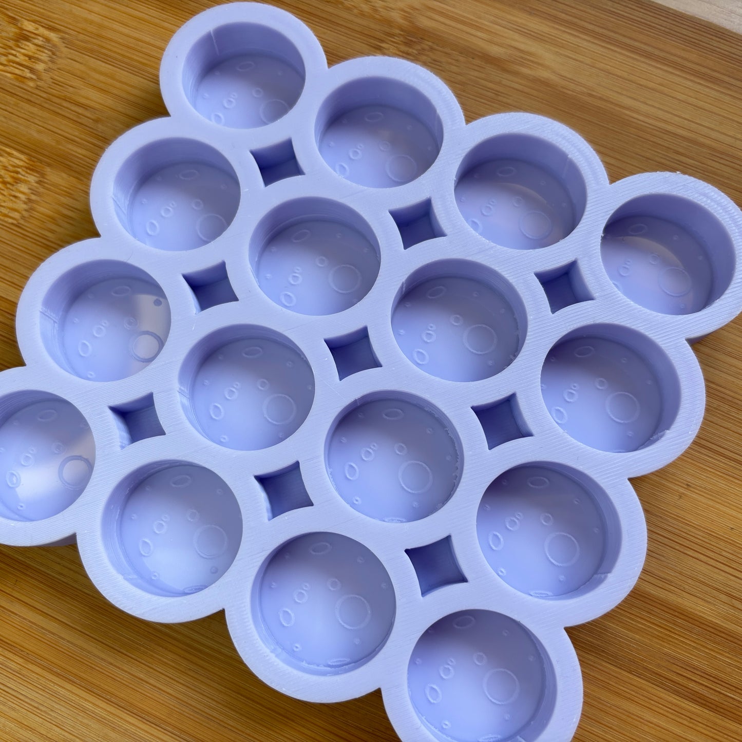 Food Safe Full Moon Silicone Mold with 16 cavities of 3 cm each.