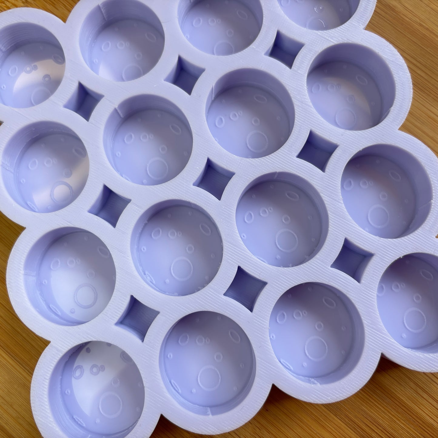 Food Safe Full Moon Silicone Mold with 16 cavities of 3 cm each.