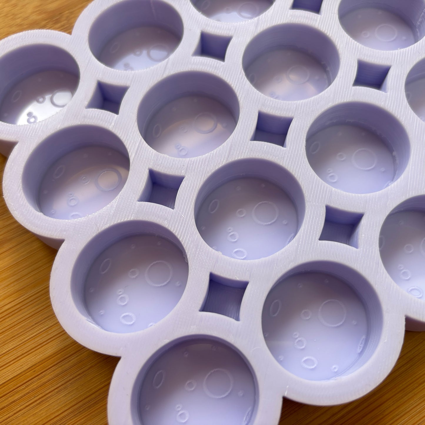 Food Safe Full Moon Silicone Mold with 16 cavities of 3 cm each.