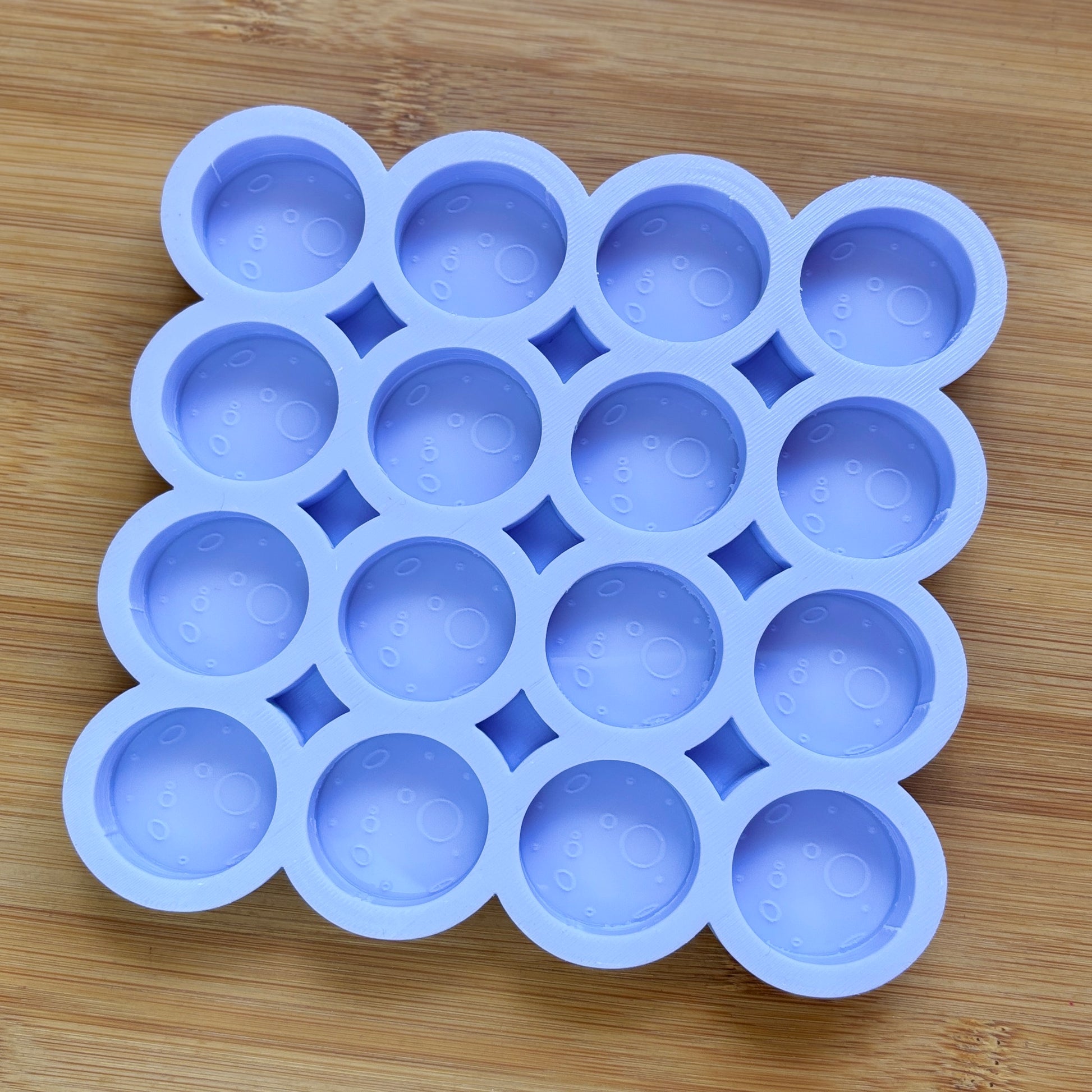 Food Safe Full Moon Silicone Mold with 16 cavities of 3 cm each.