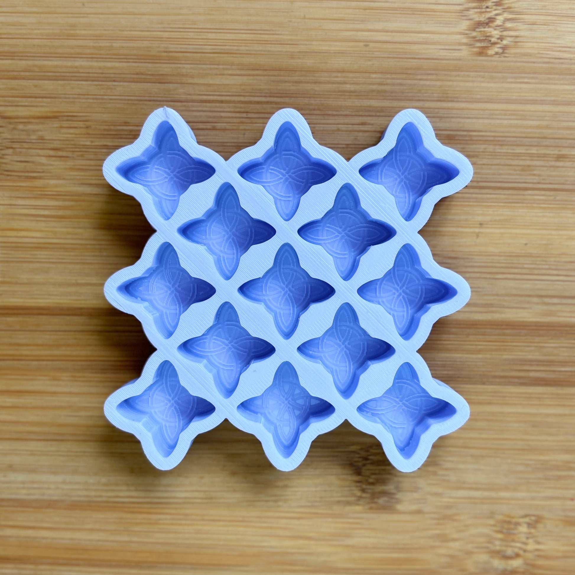 Food Safe Witch's Knot Silicone Mold with 13 cavities of  1 inch each.