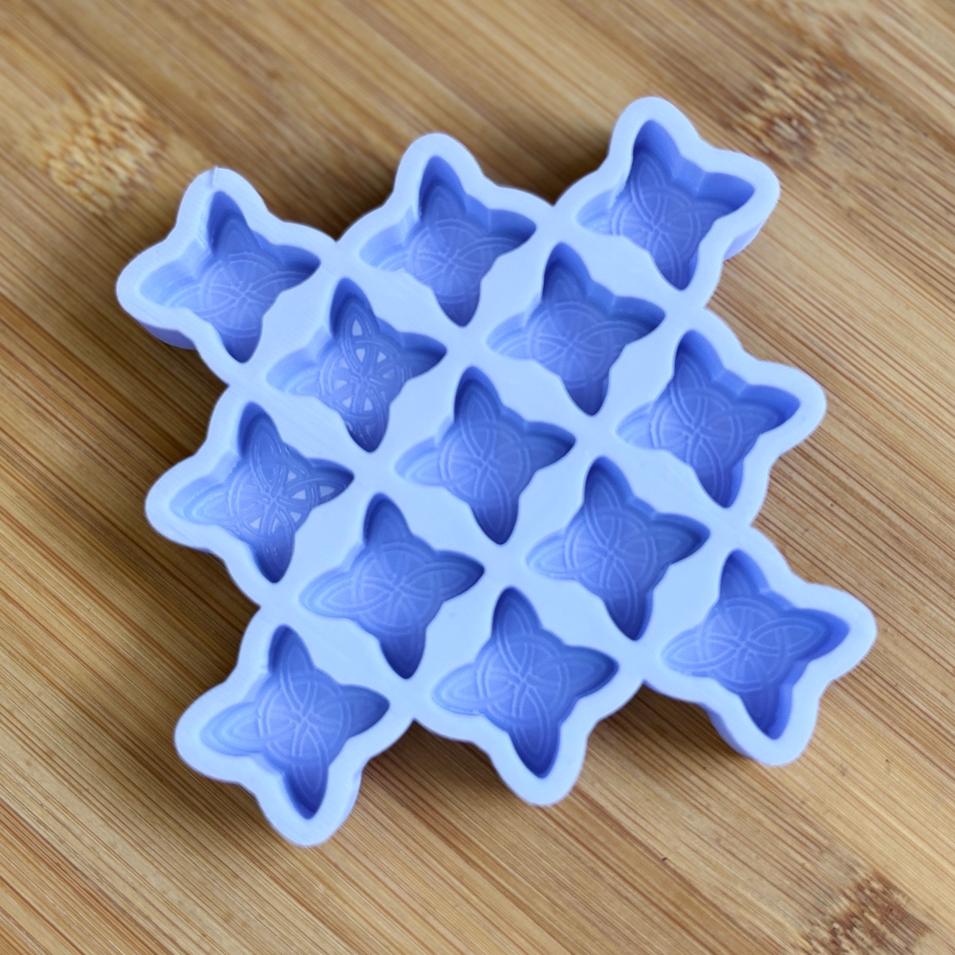 Food Safe Witch's Knot Silicone Mold with 13 cavities of  1 inch each.