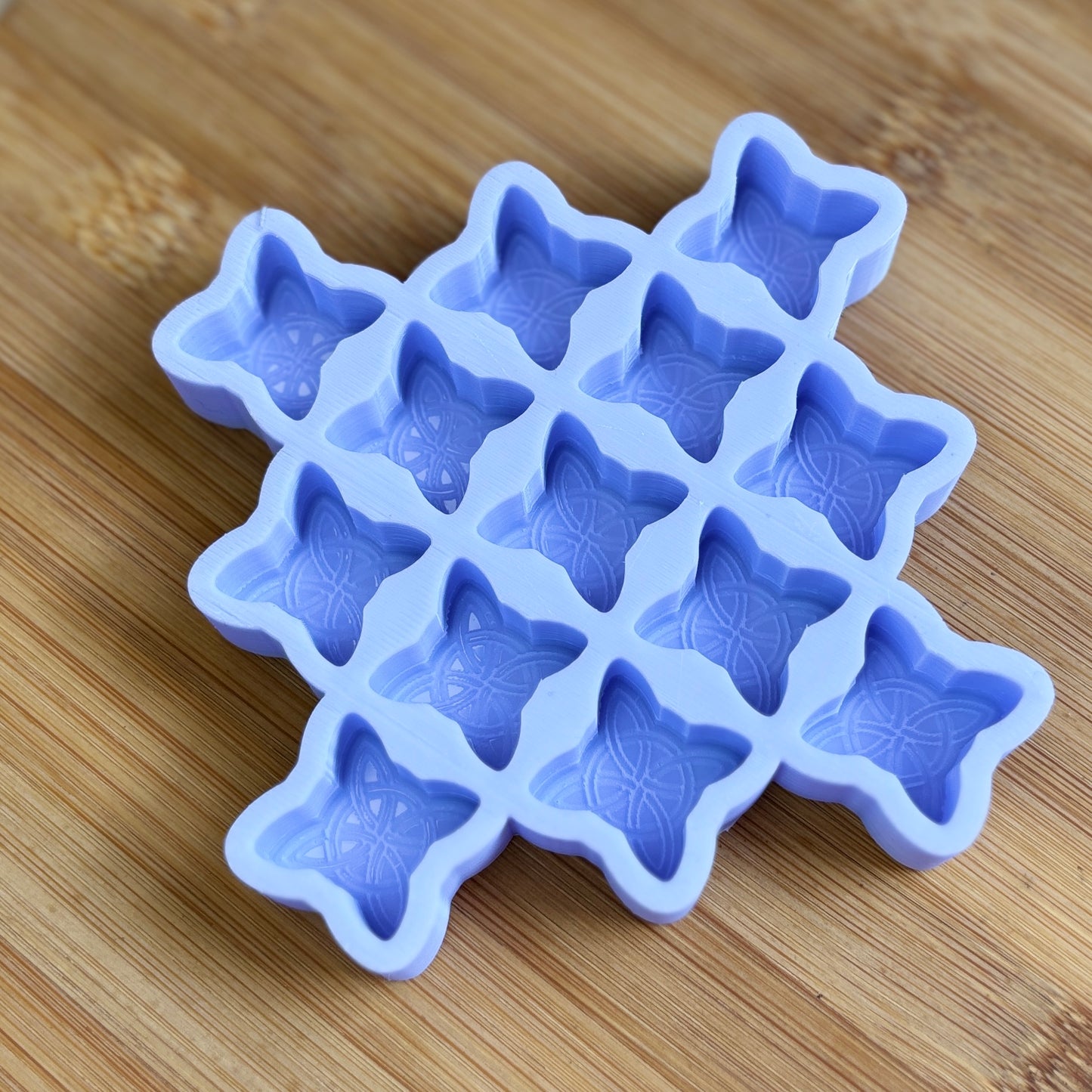 Food Safe Witch's Knot Silicone Mold with 13 cavities of  1 inch each.