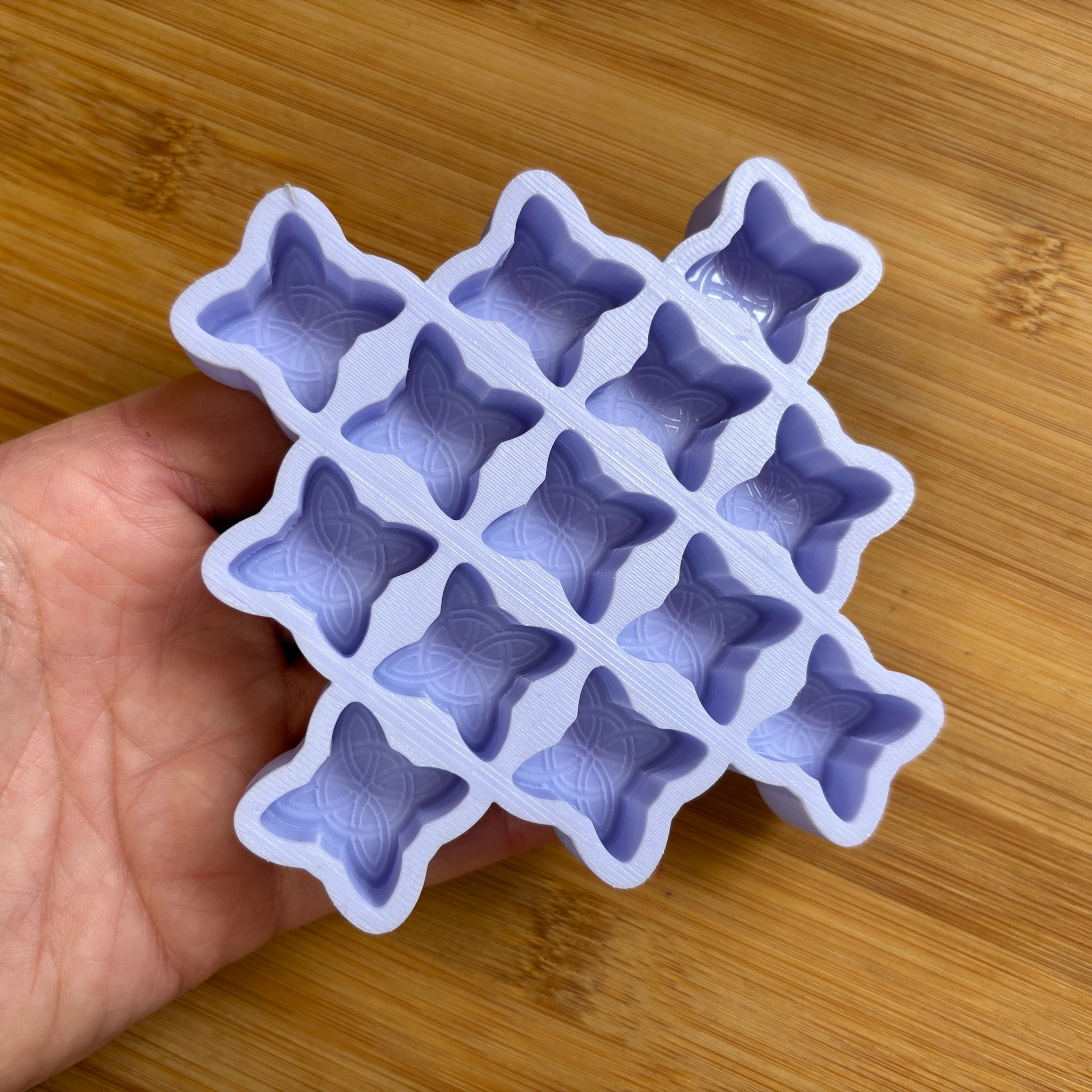 Food Safe Witch's Knot Silicone Mold with 13 cavities of  1 inch each.