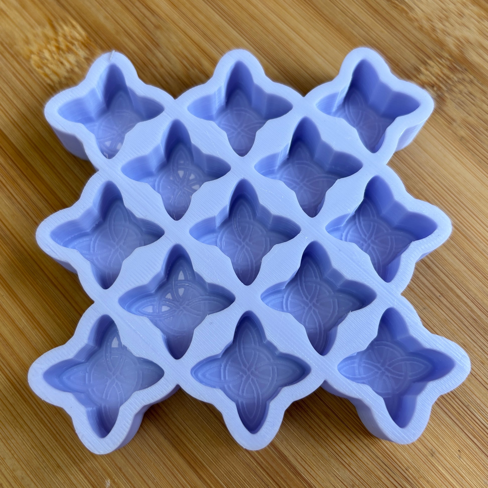 Food Safe Witch's Knot Silicone Mold with 13 cavities of  1 inch each.