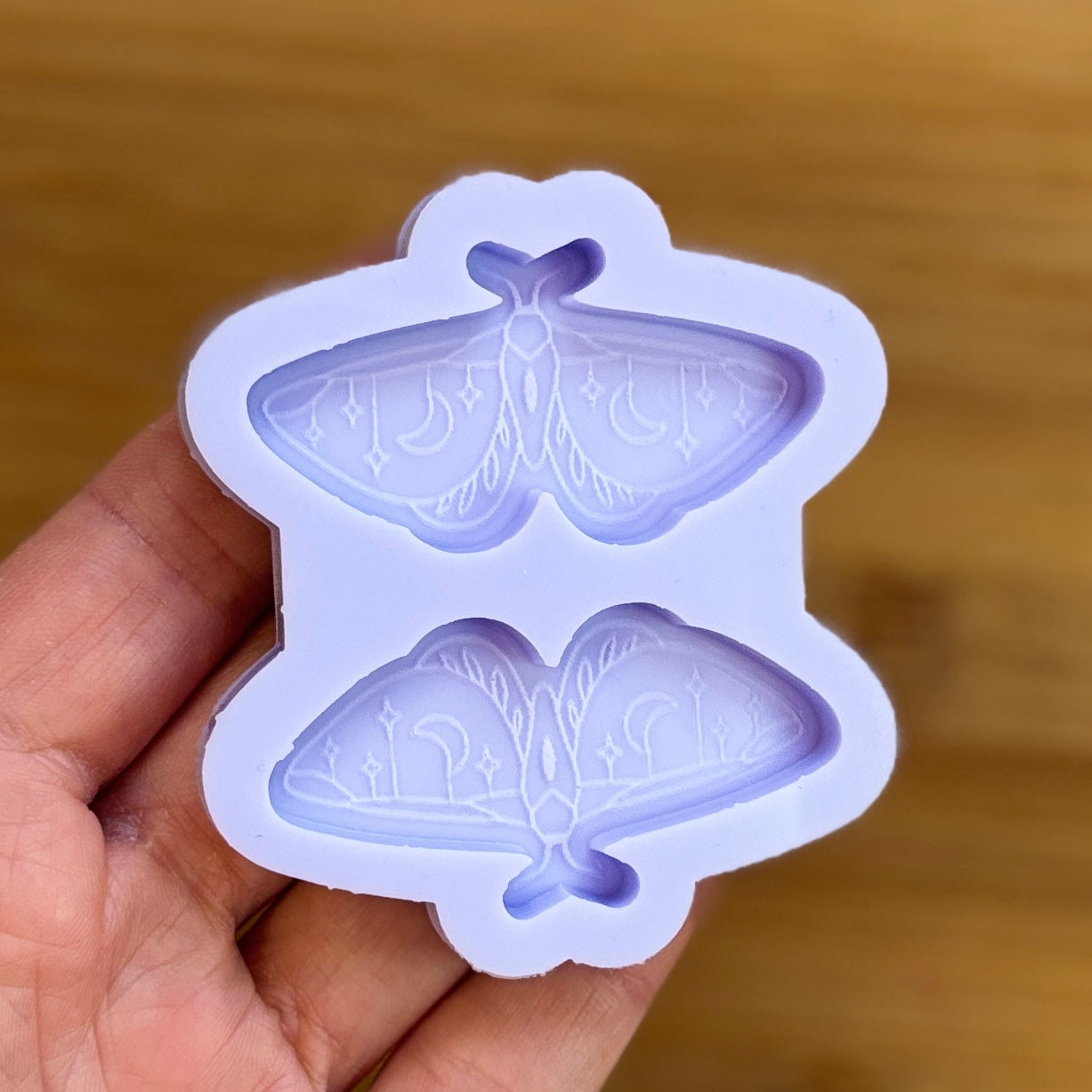 Moth silicone mold with 2 cavities made from food safe silicone.