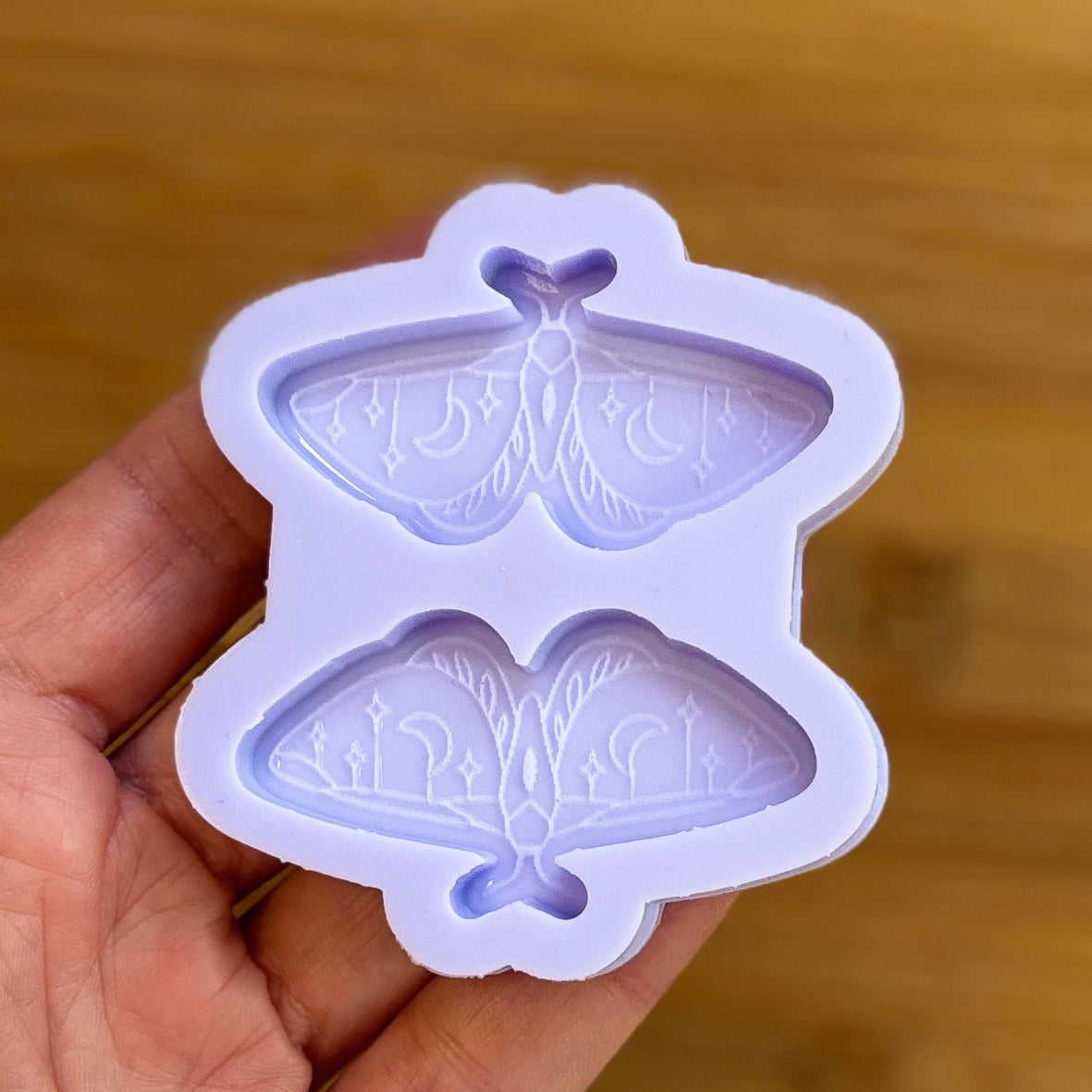 Moth silicone mold with 2 cavities made from food safe silicone.