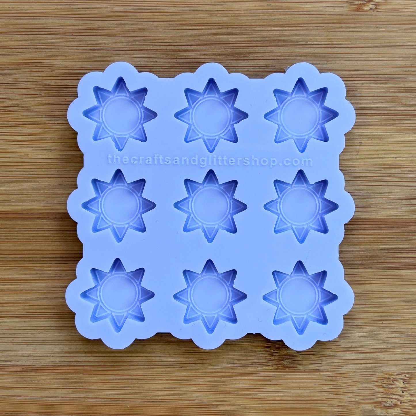 Sun silicone mold with 9 cavities, made from food safe silicone.
