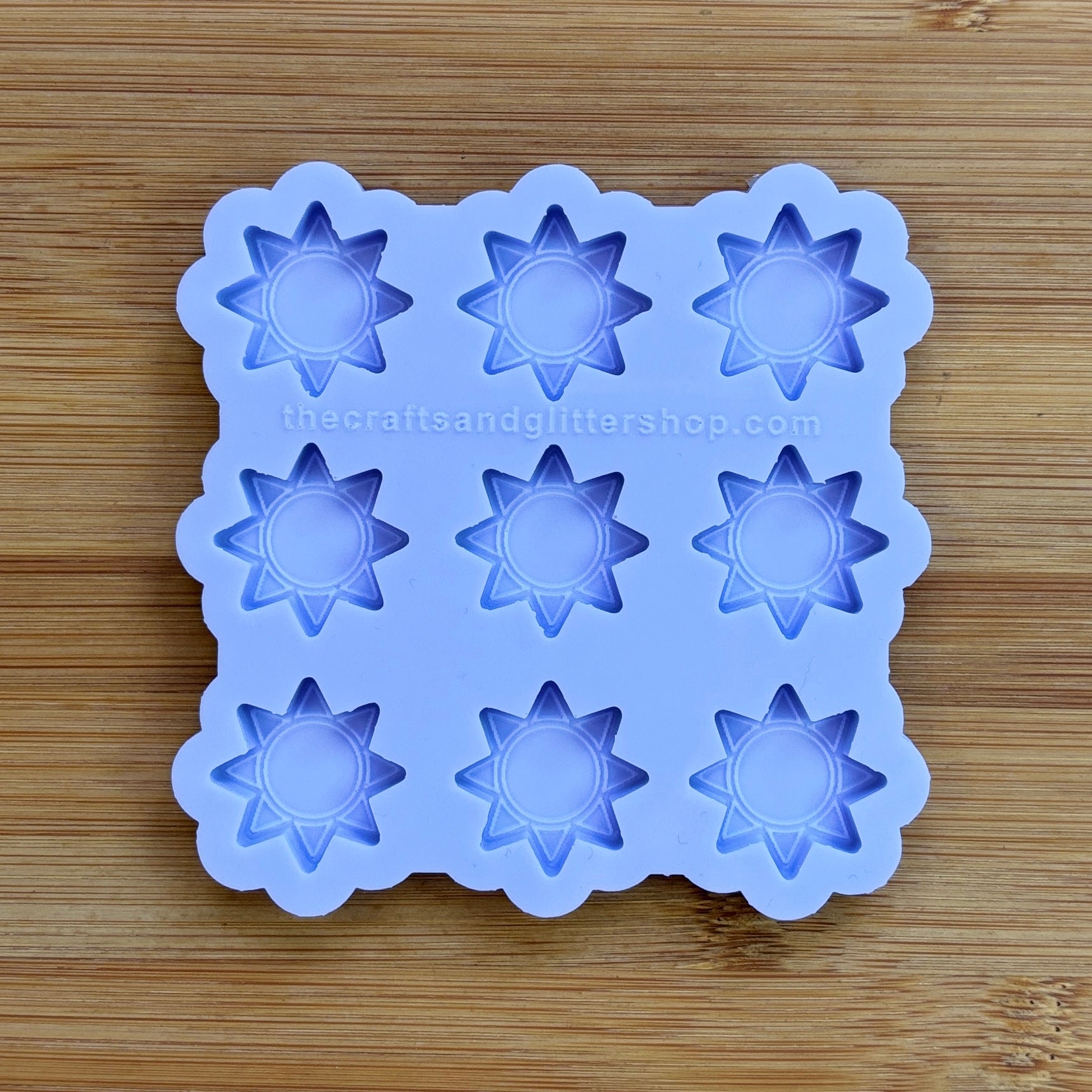 Sun silicone mold with 9 cavities, made from food safe silicone.