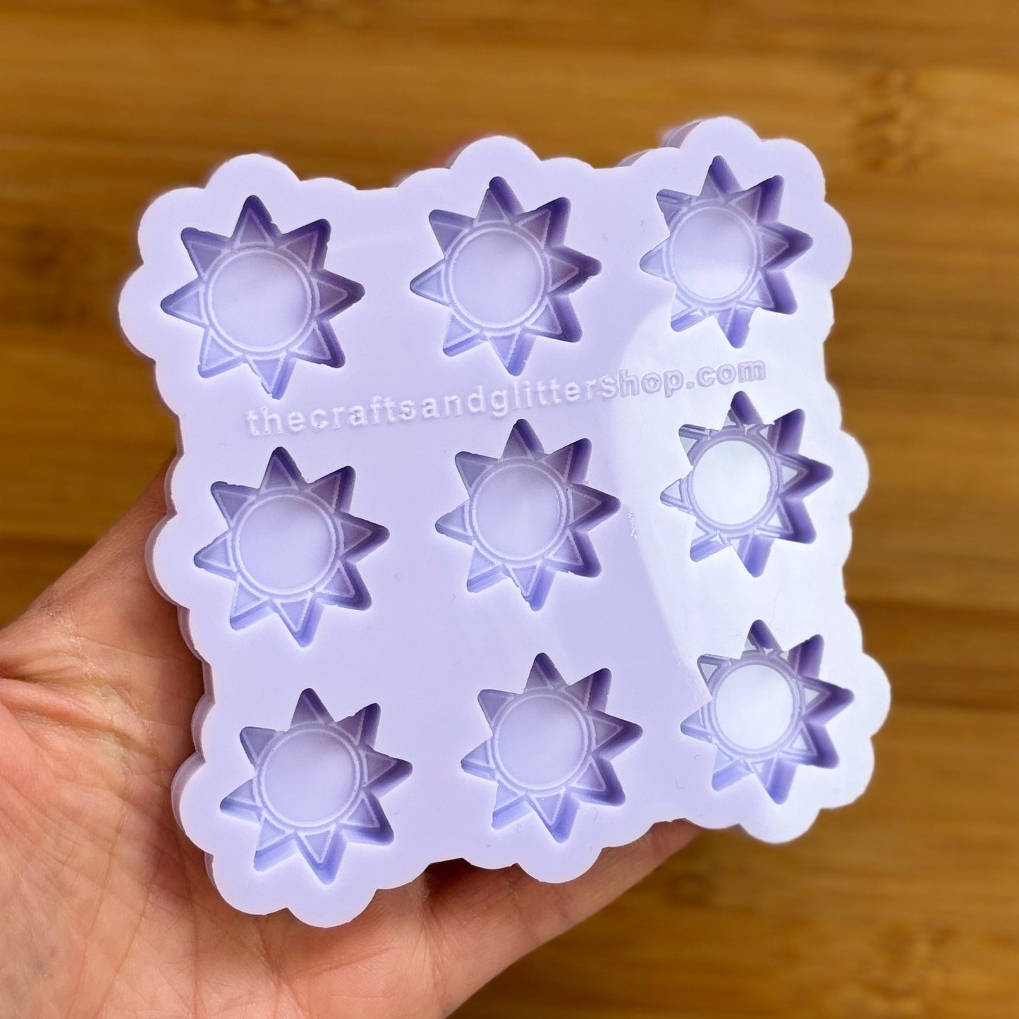 Sun silicone mold with 9 cavities, made from food safe silicone.