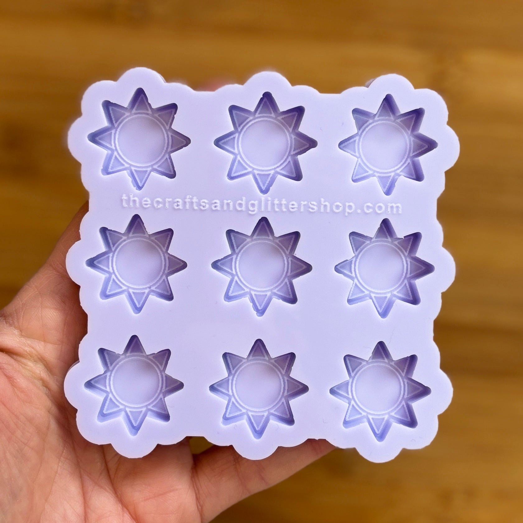 Sun silicone mold with 9 cavities, made from food safe silicone.