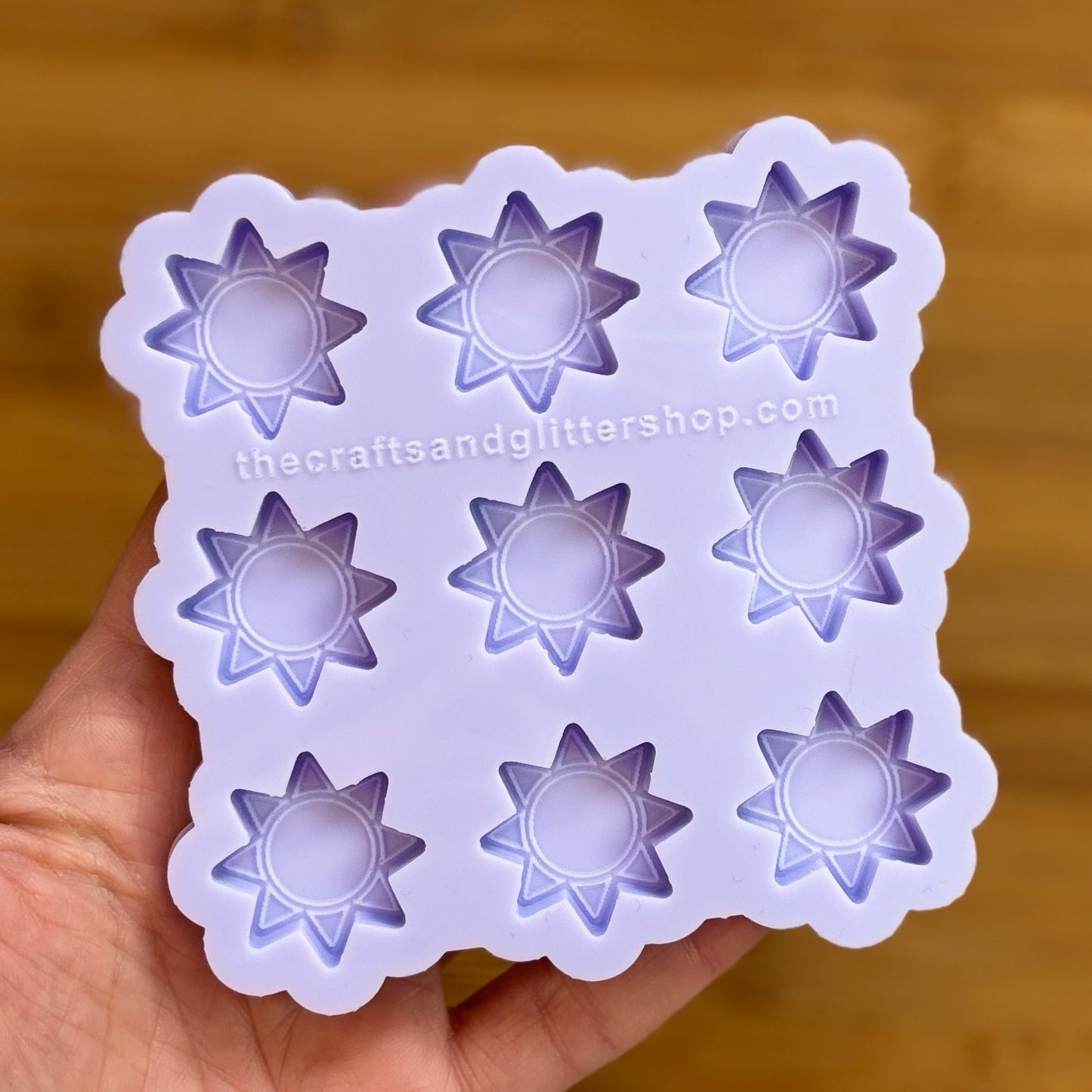 Sun silicone mold with 9 cavities, made from food safe silicone.