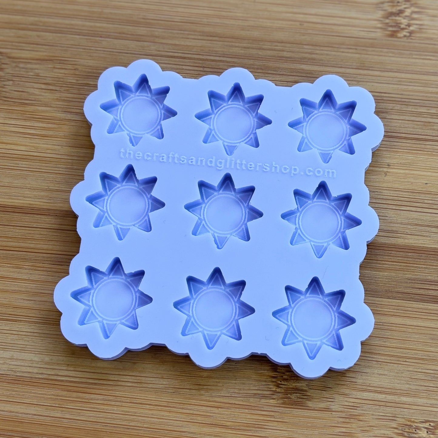 Sun silicone mold with 9 cavities, made from food safe silicone.