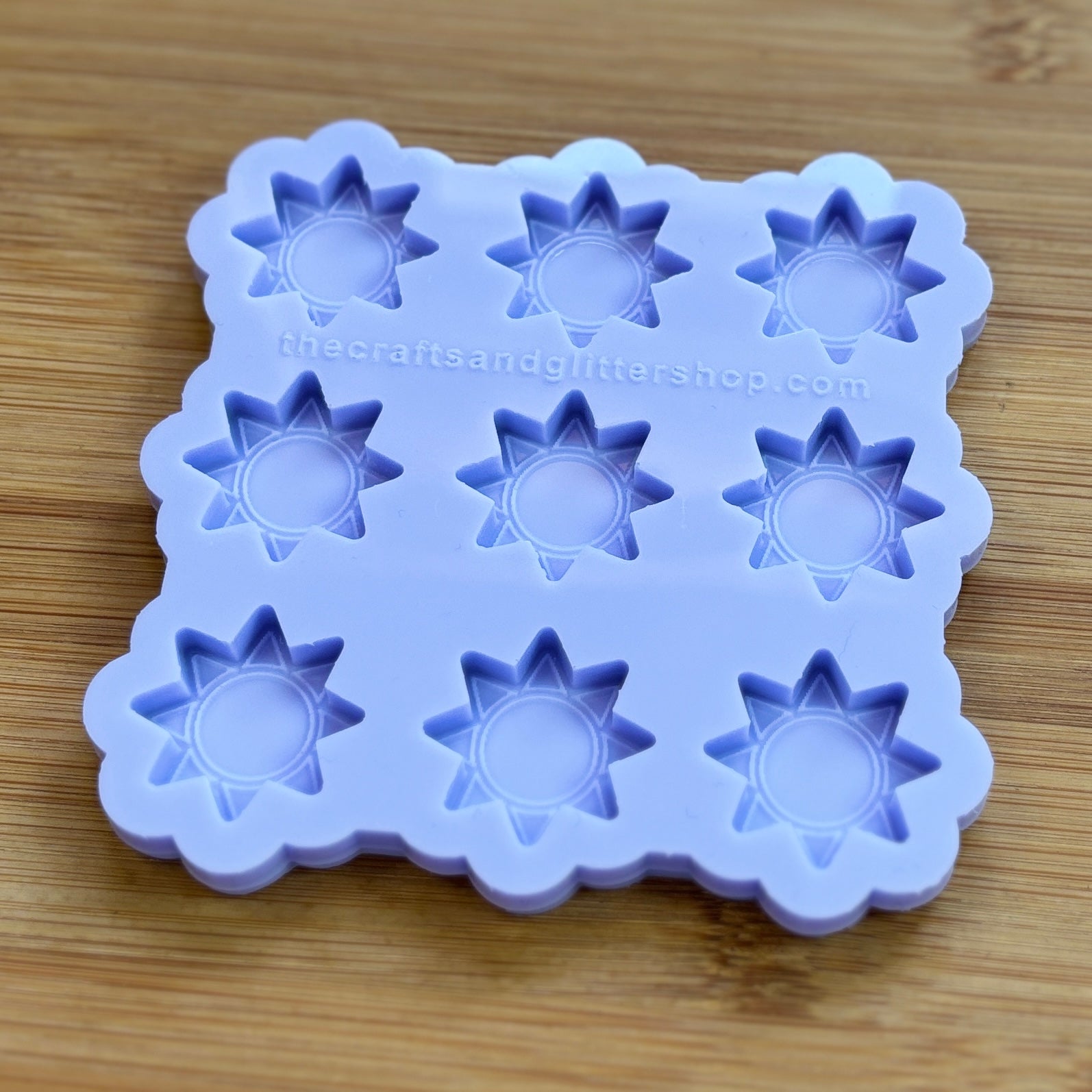 Sun silicone mold with 9 cavities, made from food safe silicone.