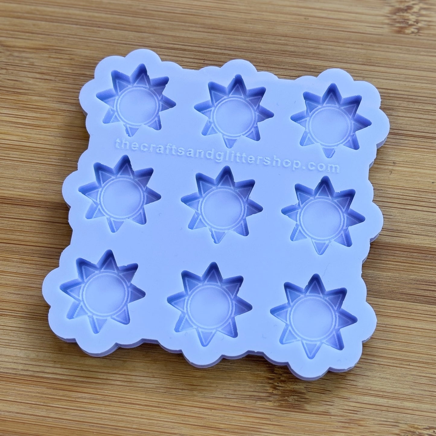 Sun silicone mold with 9 cavities, made from food safe silicone.