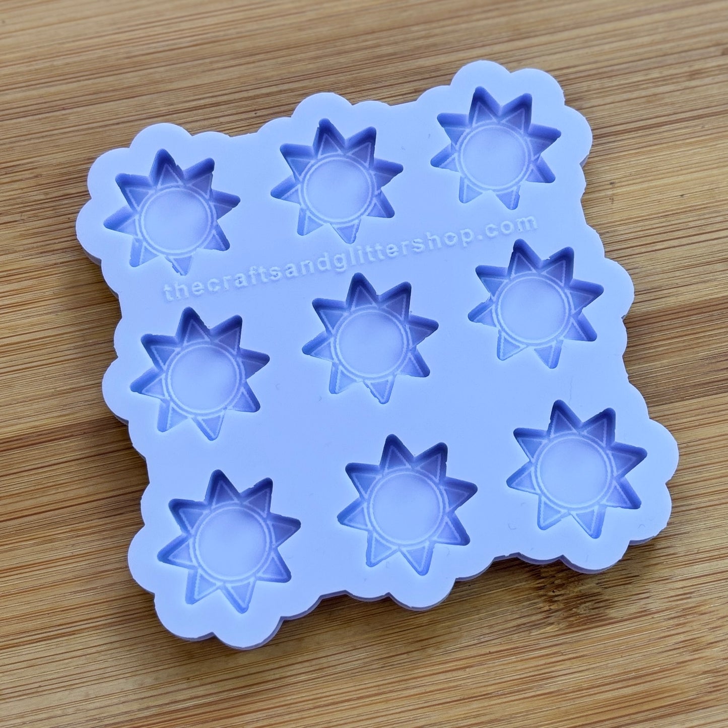 Sun silicone mold with 9 cavities, made from food safe silicone.