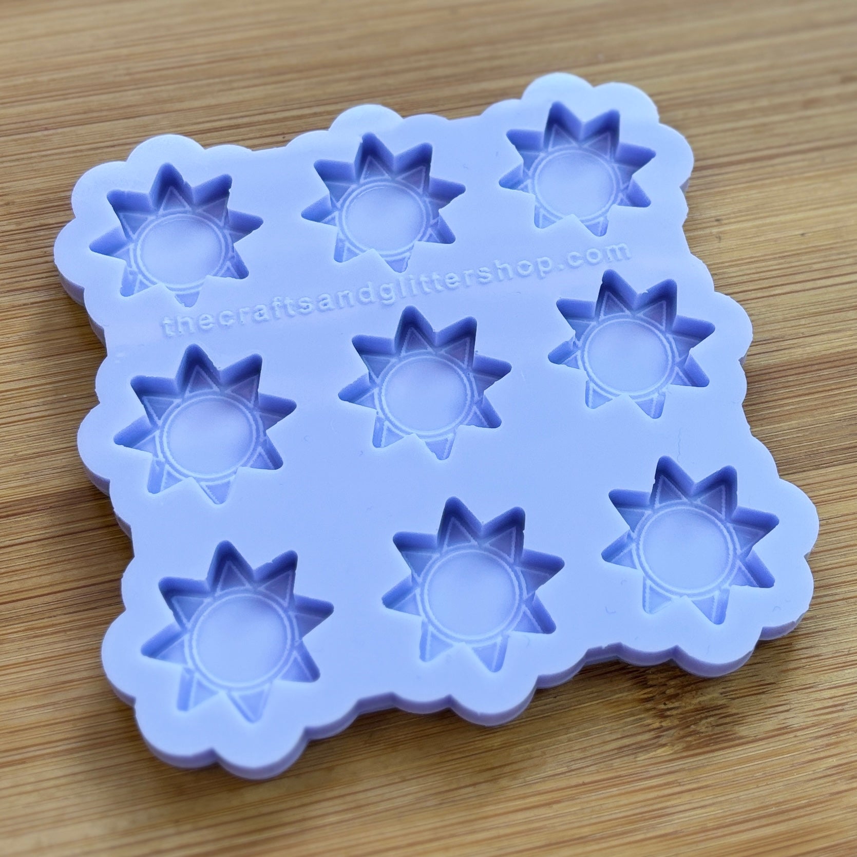 Sun silicone mold with 9 cavities, made from food safe silicone.