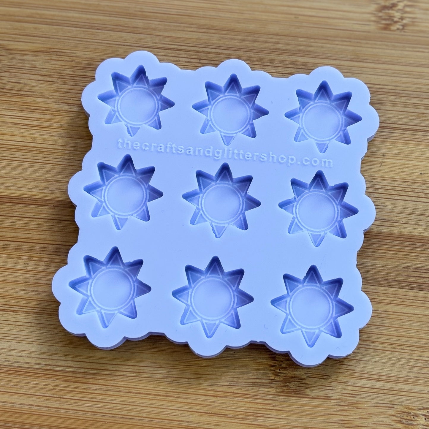 Sun silicone mold with 9 cavities, made from food safe silicone.
