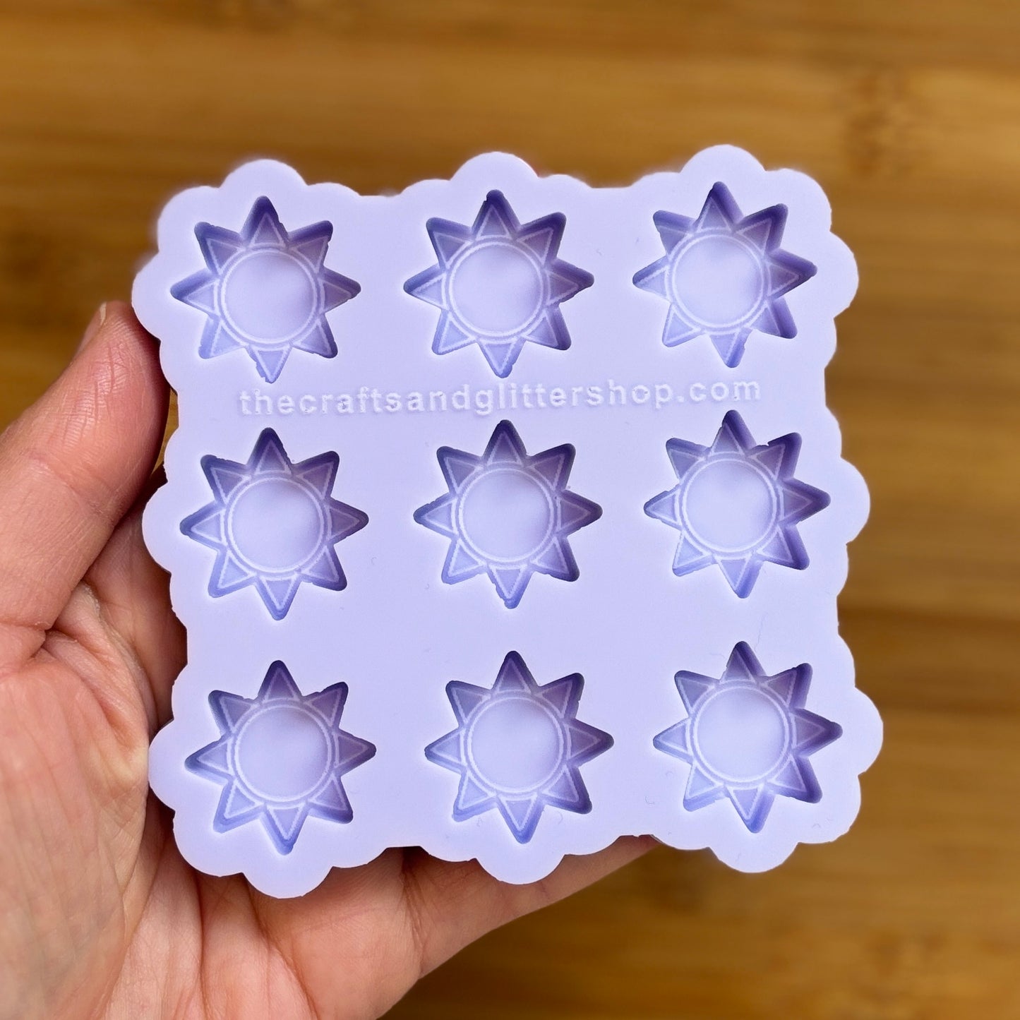 Sun silicone mold with 9 cavities, made from food safe silicone.