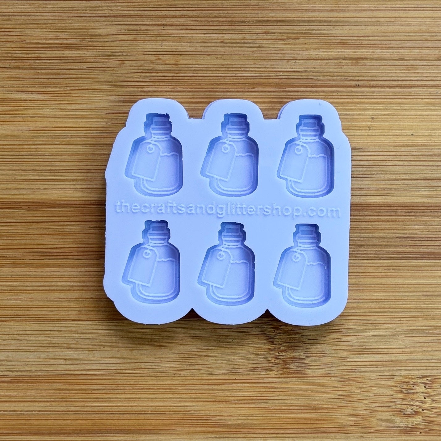 Elixir Silicone Mold with 6 cavities of 1 inch each, made from food safe silicone. Oven and freezer safe.