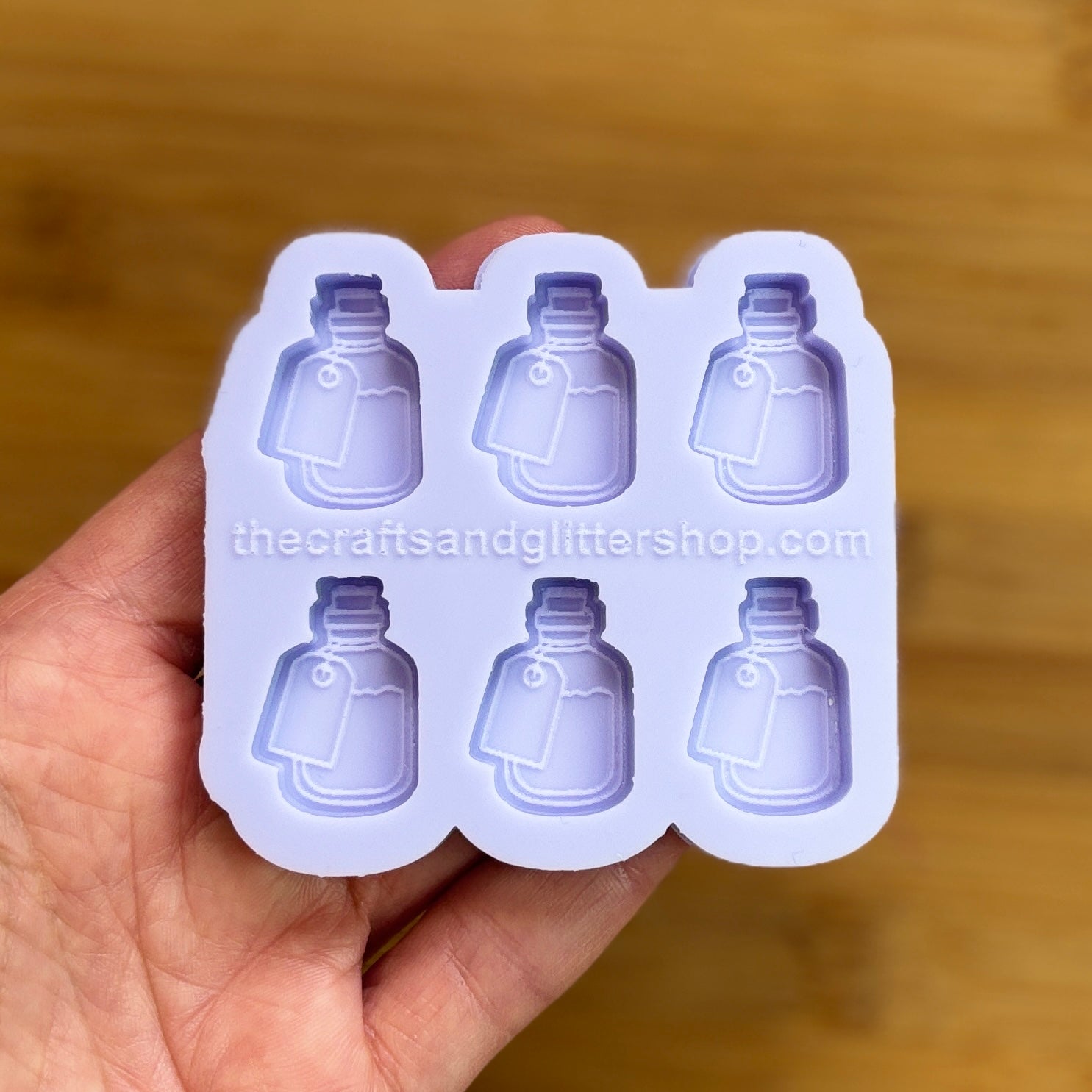 Elixir Silicone Mold with 6 cavities of 1 inch each, made from food safe silicone. Oven and freezer safe.