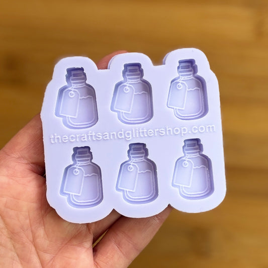 Elixir Silicone Mold with 6 cavities of 1 inch each, made from food safe silicone. Oven and freezer safe.