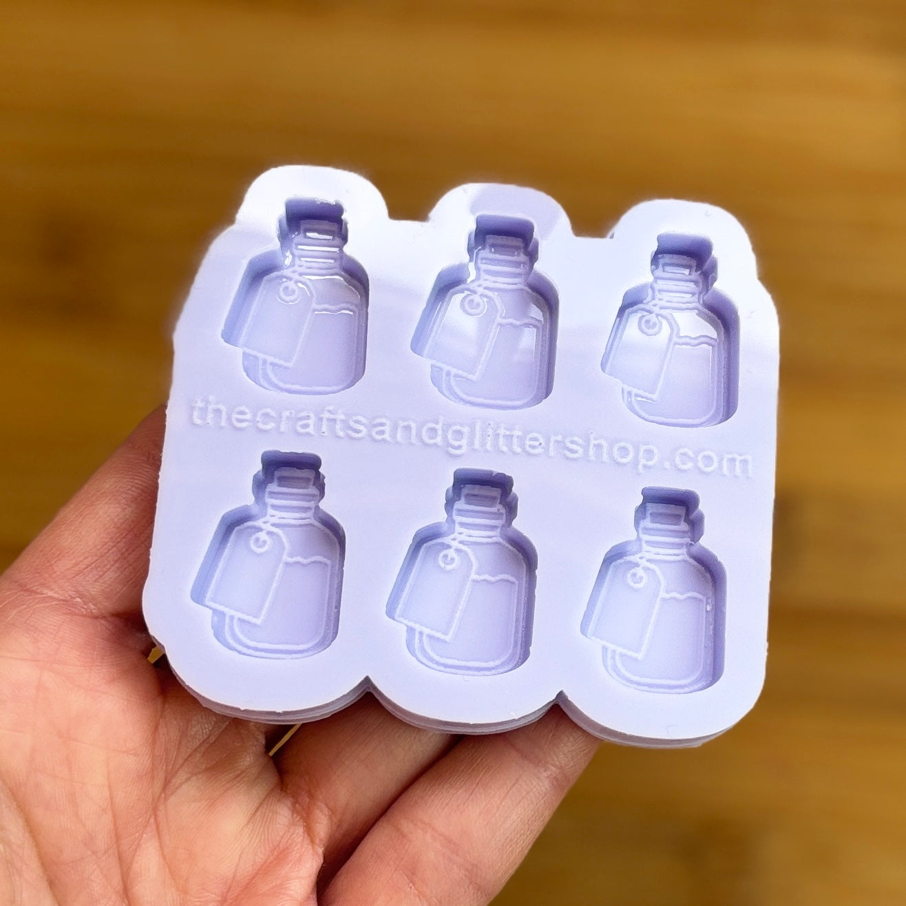 Elixir Silicone Mold with 6 cavities of 1 inch each, made from food safe silicone. Oven and freezer safe.