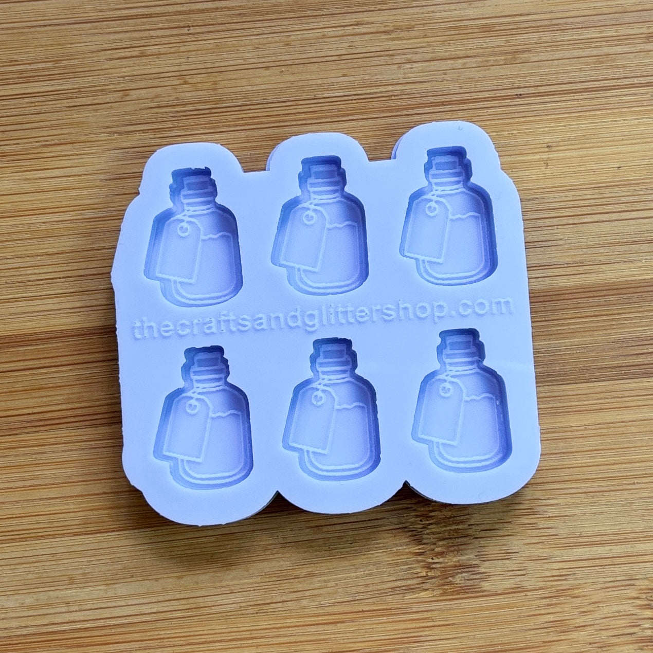 Elixir Silicone Mold with 6 cavities of 1 inch each, made from food safe silicone. Oven and freezer safe.