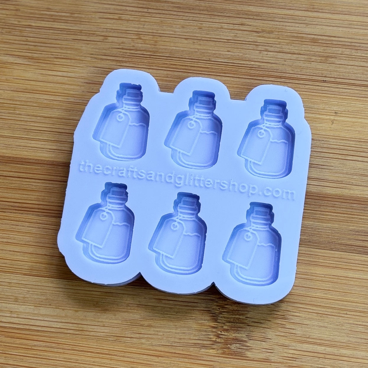 Elixir Silicone Mold with 6 cavities of 1 inch each, made from food safe silicone. Oven and freezer safe.