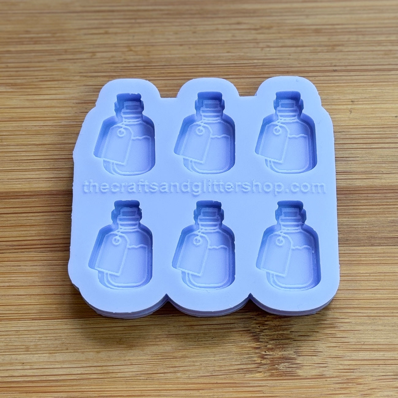 Elixir Silicone Mold with 6 cavities of 1 inch each, made from food safe silicone. Oven and freezer safe.