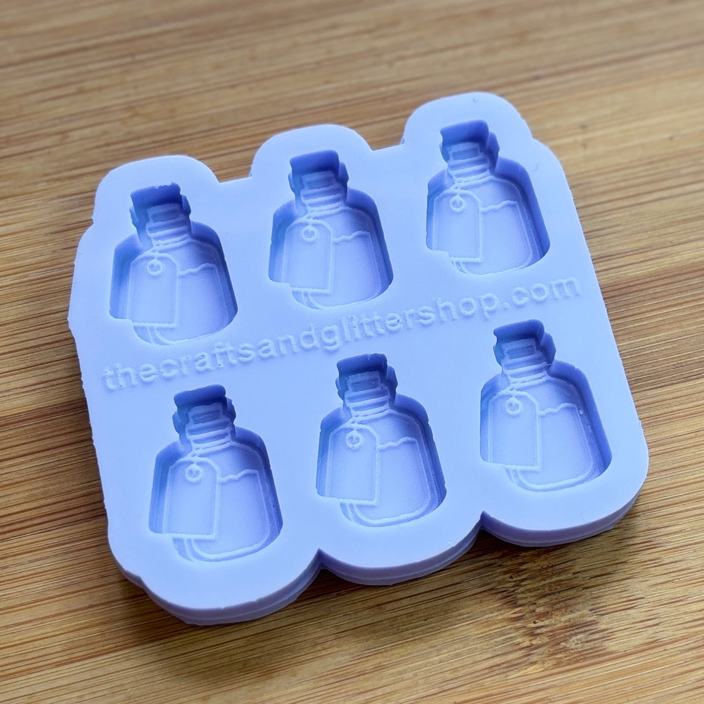 Elixir Silicone Mold with 6 cavities of 1 inch each, made from food safe silicone. Oven and freezer safe.
