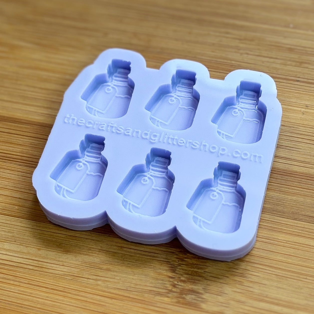 Elixir Silicone Mold with 6 cavities of 1 inch each, made from food safe silicone. Oven and freezer safe.