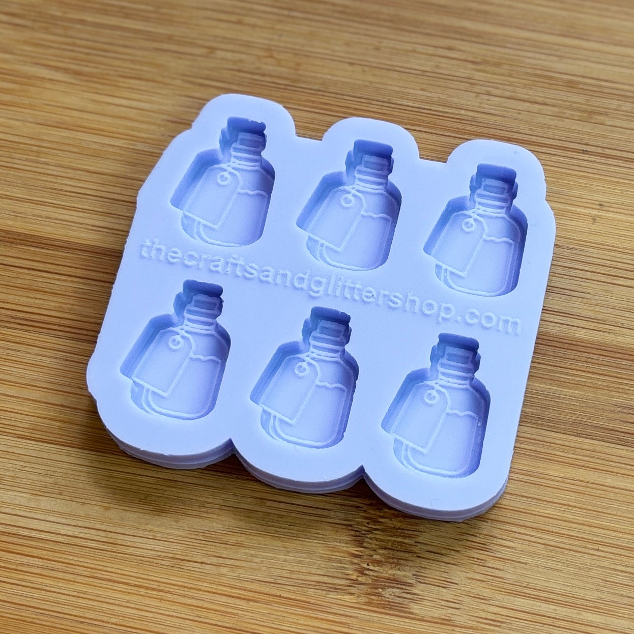 Elixir Silicone Mold with 6 cavities of 1 inch each, made from food safe silicone. Oven and freezer safe.