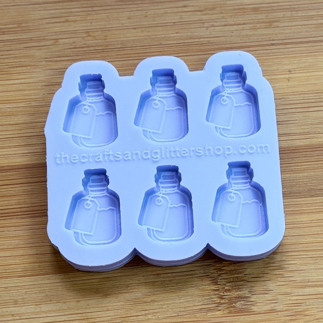 Elixir Silicone Mold with 6 cavities of 1 inch each, made from food safe silicone. Oven and freezer safe.