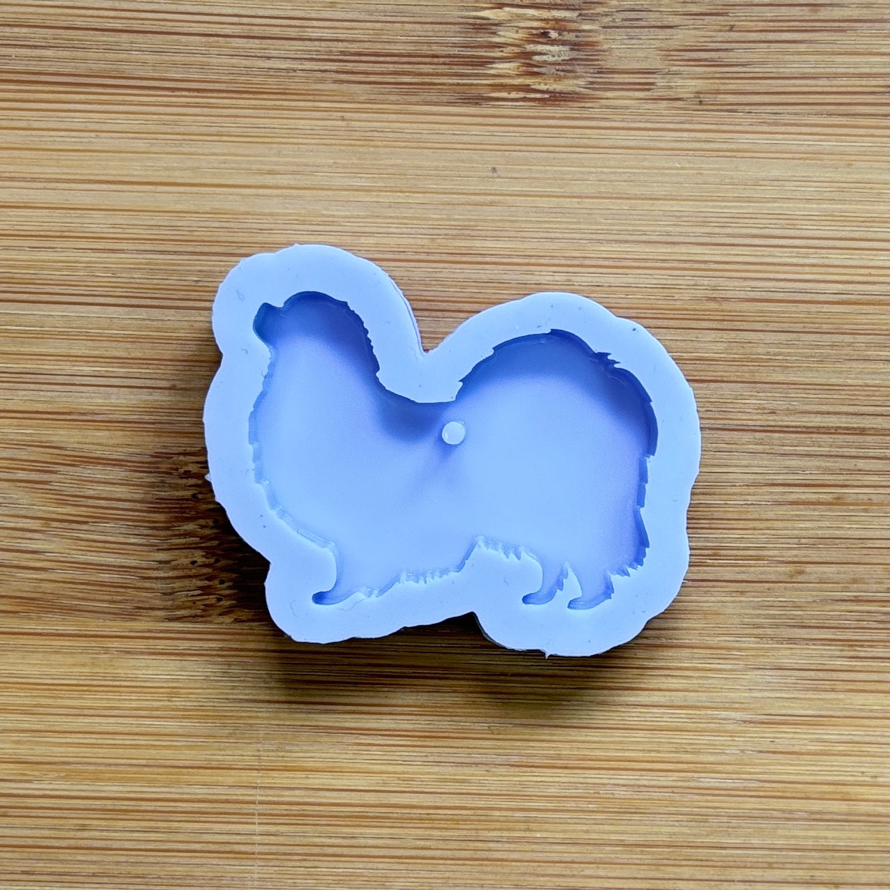 Tibetan Spaniel Silicone Mold with 1 cavity, made with Food Safe Silicone suitable for both food and craft projects.