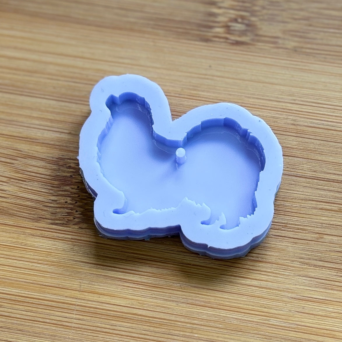 Tibetan Spaniel Silicone Mold with 1 cavity, made with Food Safe Silicone suitable for both food and craft projects.