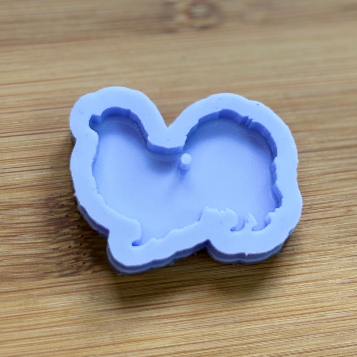 Tibetan Spaniel Silicone Mold with 1 cavity, made with Food Safe Silicone suitable for both food and craft projects.