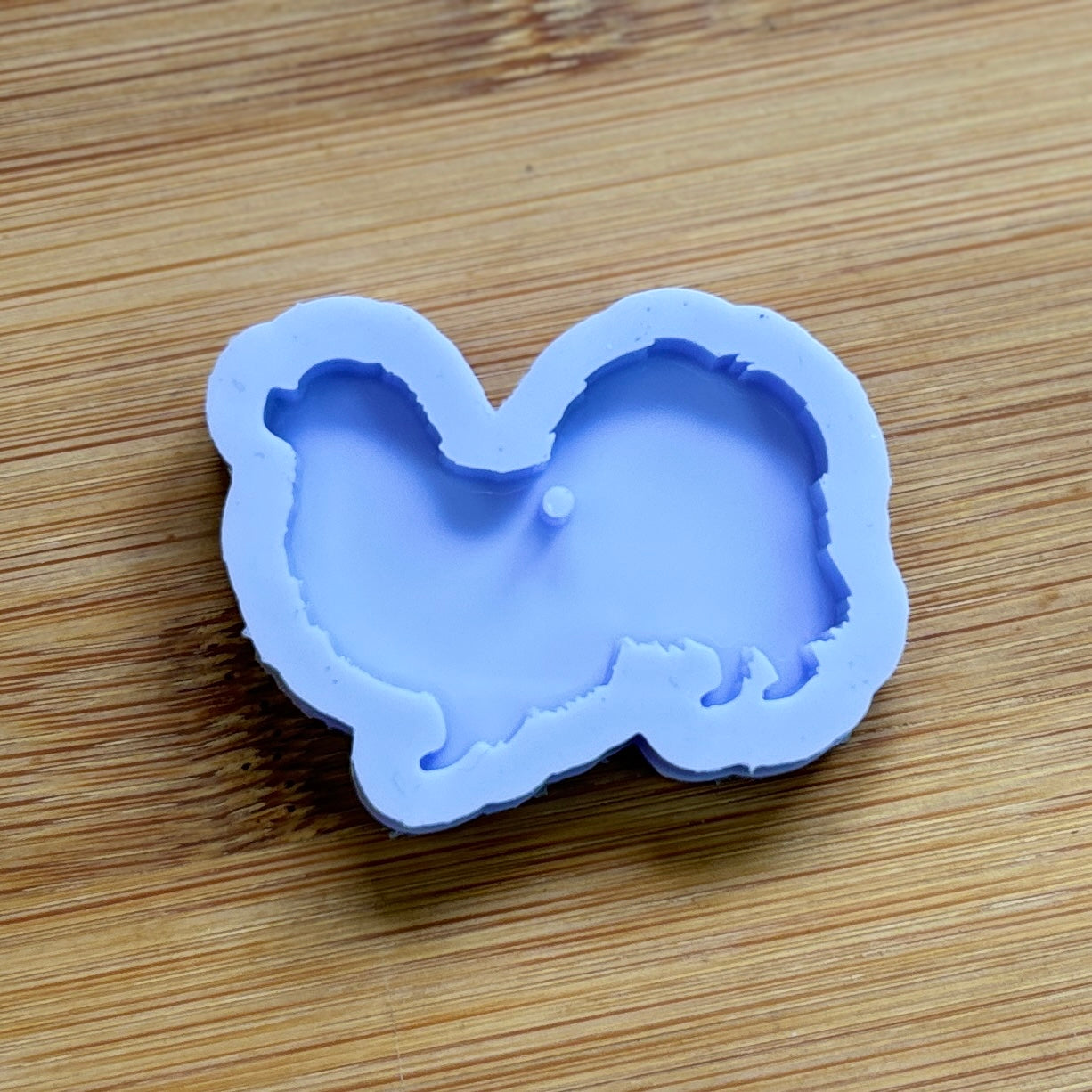 Tibetan Spaniel Silicone Mold with 1 cavity, made with Food Safe Silicone suitable for both food and craft projects.