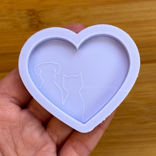 Heart shaped Silicone Mold with a cat and dog, made with Food Safe Silicone suitable for both food and craft projects.
