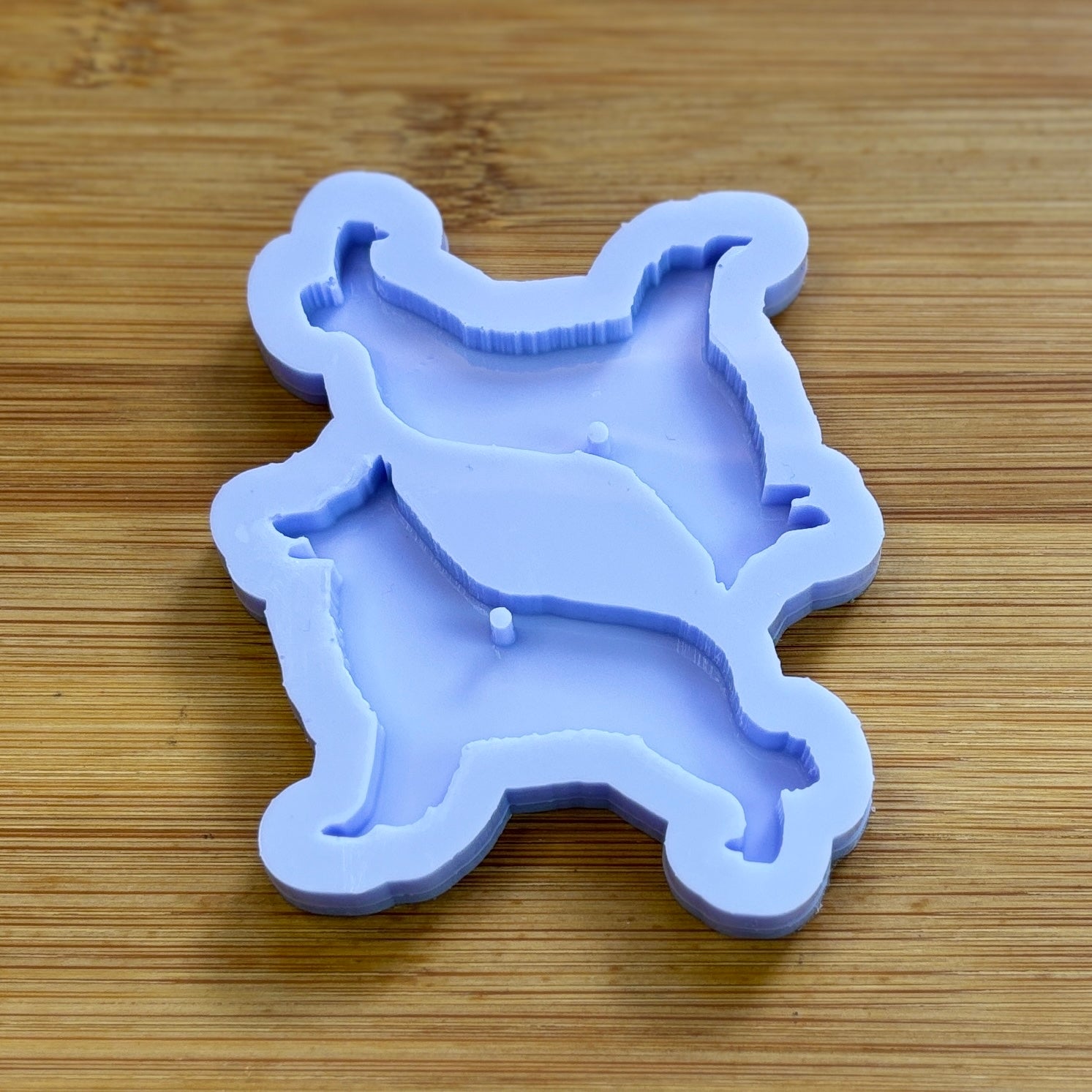 White Shepherd Silicone Mold with 2 cavities, made with Food Safe Silicone suitable for both food and craft projects.