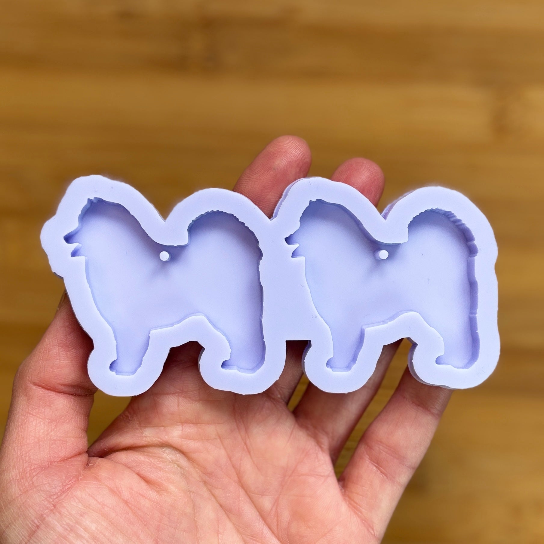 Samoyed Silhouette Silicone Mold with 2 cavities, made with Food Safe Silicone suitable for both food and craft projects.