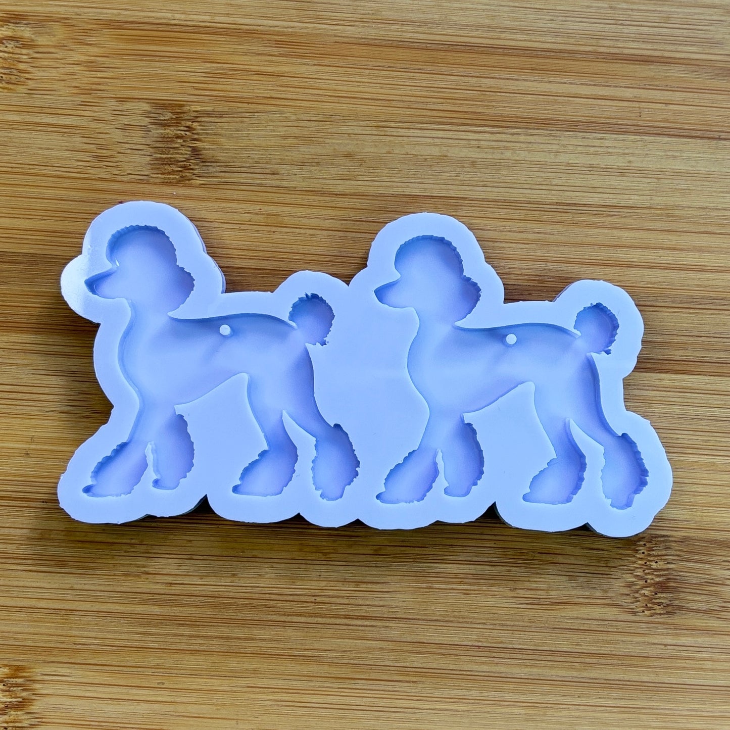 Poodle Silicone Mold with 2 cavities, made with Food Safe Silicone suitable for both food and craft projects.